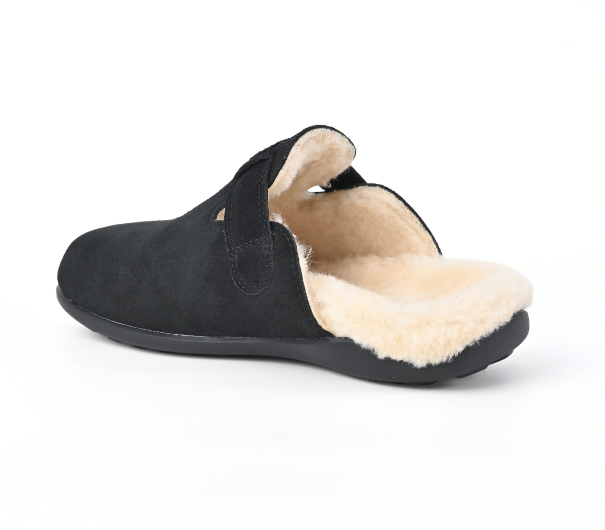 A single black slip-on mule shoe with a soft beige shearling-style lining, shown from a side angle on a white background. Strive Footwear Oslo II Women’s Black Slippers