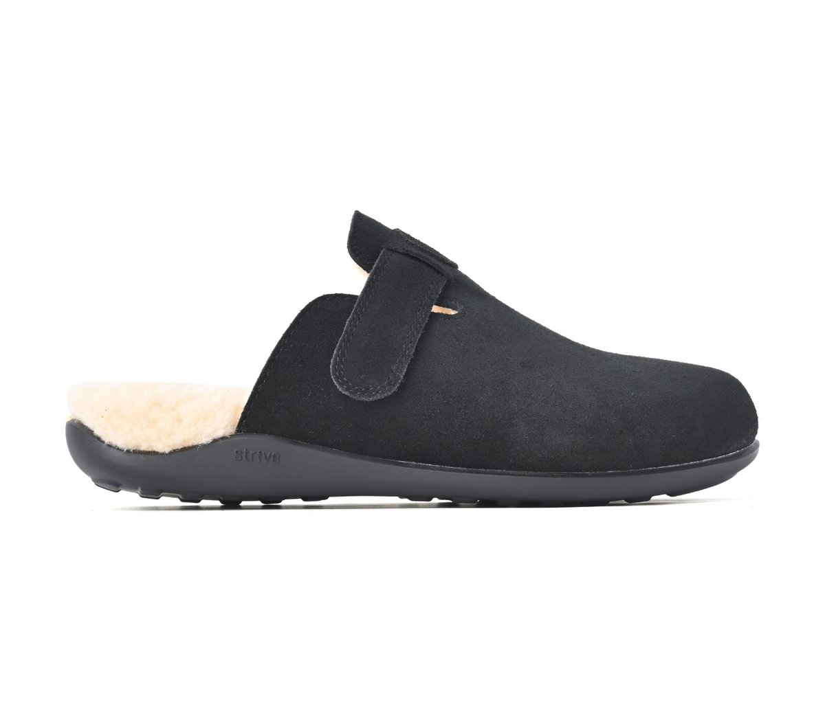 A single black slip-on clog-style mule shoe with a plush beige shearling lining and a black sole, shown in profile against a plain white background. Strive Footwear Oslo II Women’s Black Slippers