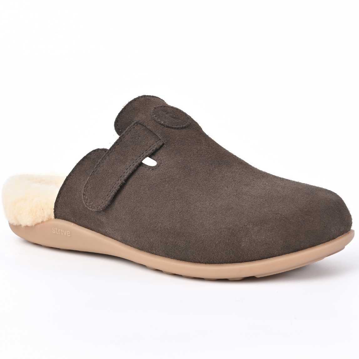 A dark brown suede clog-style slipper with a light beige sole and a cream-colored shearling lining, shown from a side profile on a white background. Strive Footwear Oslo II Women’s Brown Slippers