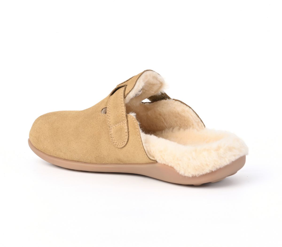 A tan suede clog-style slipper with a plush cream shearling lining, shown from a side profile view on a white background. Strive Footwear Oslo II Women’s Tan Slippers
