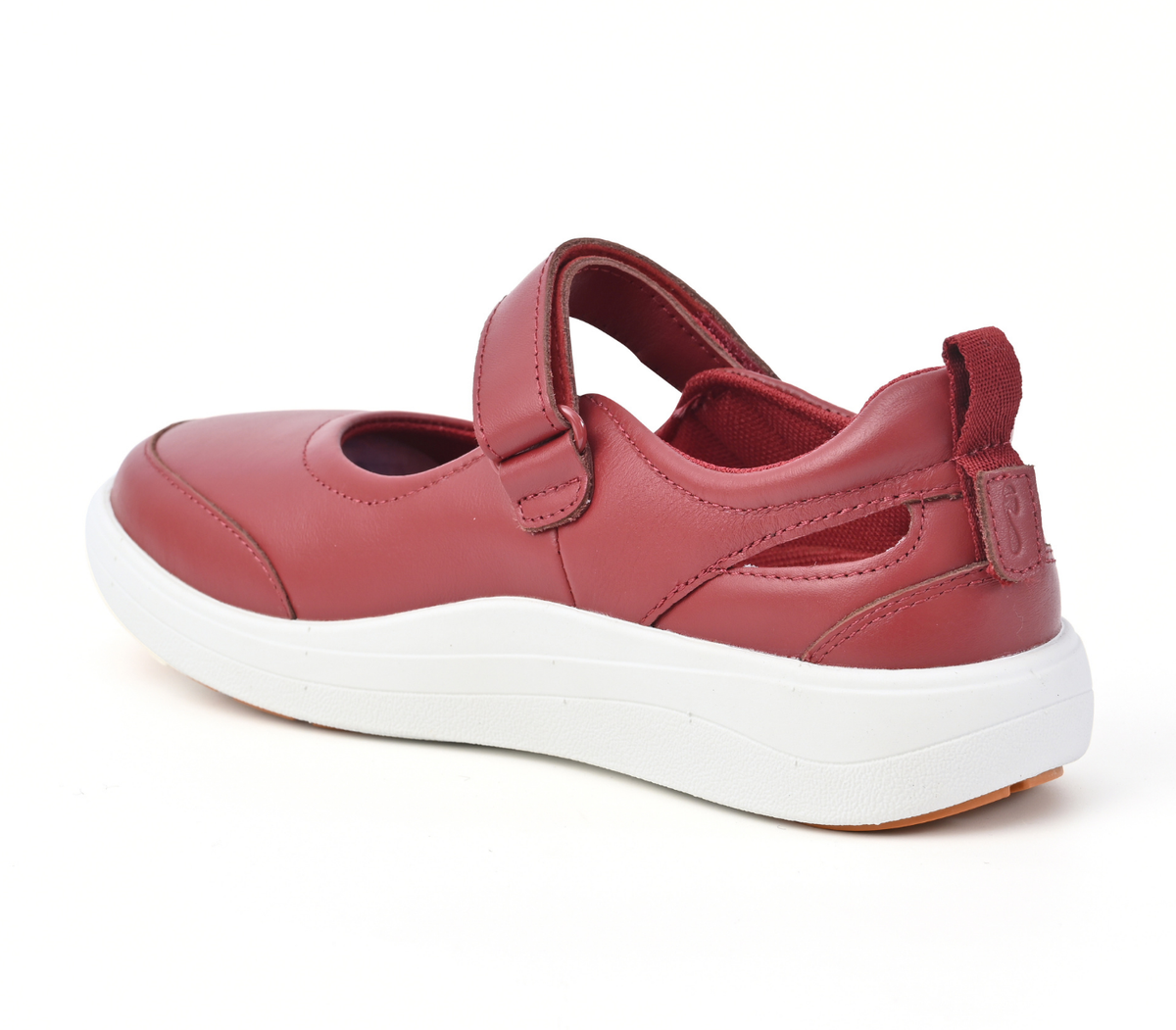 Strive Footwear Skip women's Mary Jane-style shoe in a dusty rose red color, featuring a hook-and-loop strap closure and a thick white platform sole, shown from a side-rear angle on a white background.