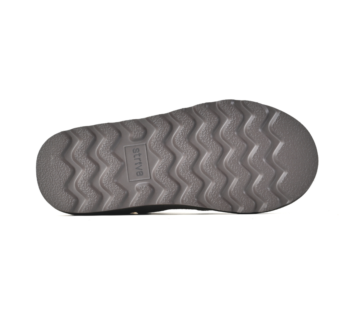 The textured gray rubber outsole of a shoe, featuring a wavy tread pattern and the brand name 'STIFFE' embossed in the centre, shown against a plain white background. Strive Footwear Women’s Alaska Brown Slippers
