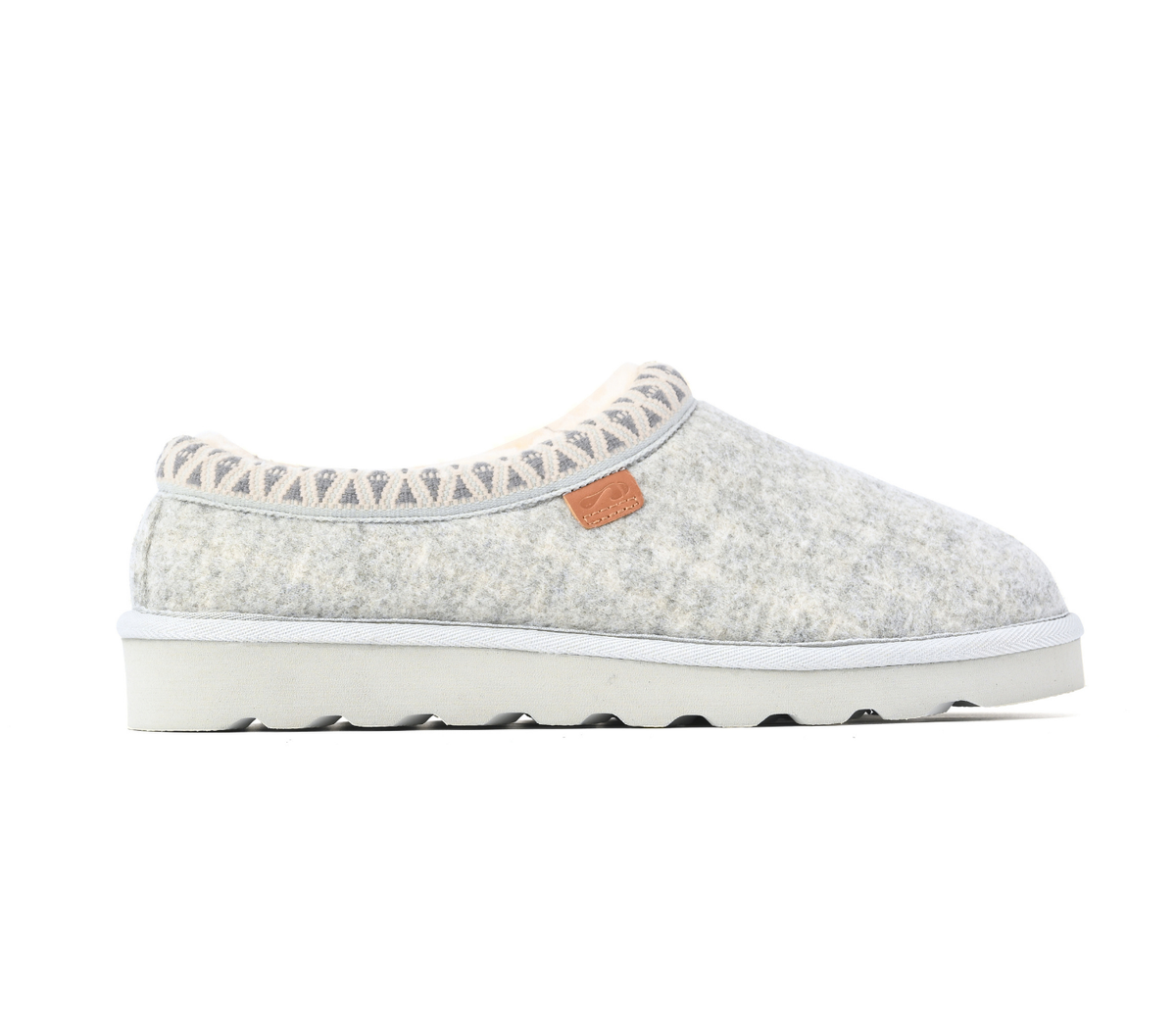 A single slip-on felt slipper in a light grey and white speckled pattern, featuring a white sole with a wavy tread and a small brown leather brand tab on the side. Strive Footwear Zurich Felt Slippers Grey