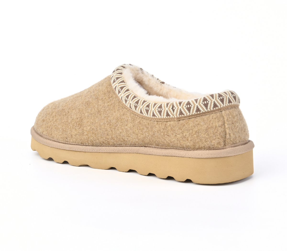 A single slip-on winter slipper in beige felt with a cream sherpa lining and a geometric patterned trim, shown from a side profile on a white background.
