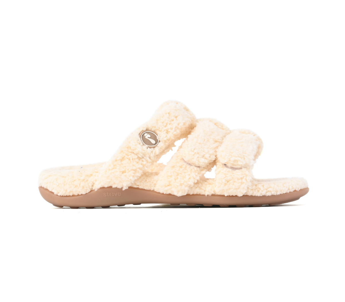 A single cream-colored fluffy shearling slide sandal with a tan sole and a small metallic logo on the strap, shown in profile against a white background.