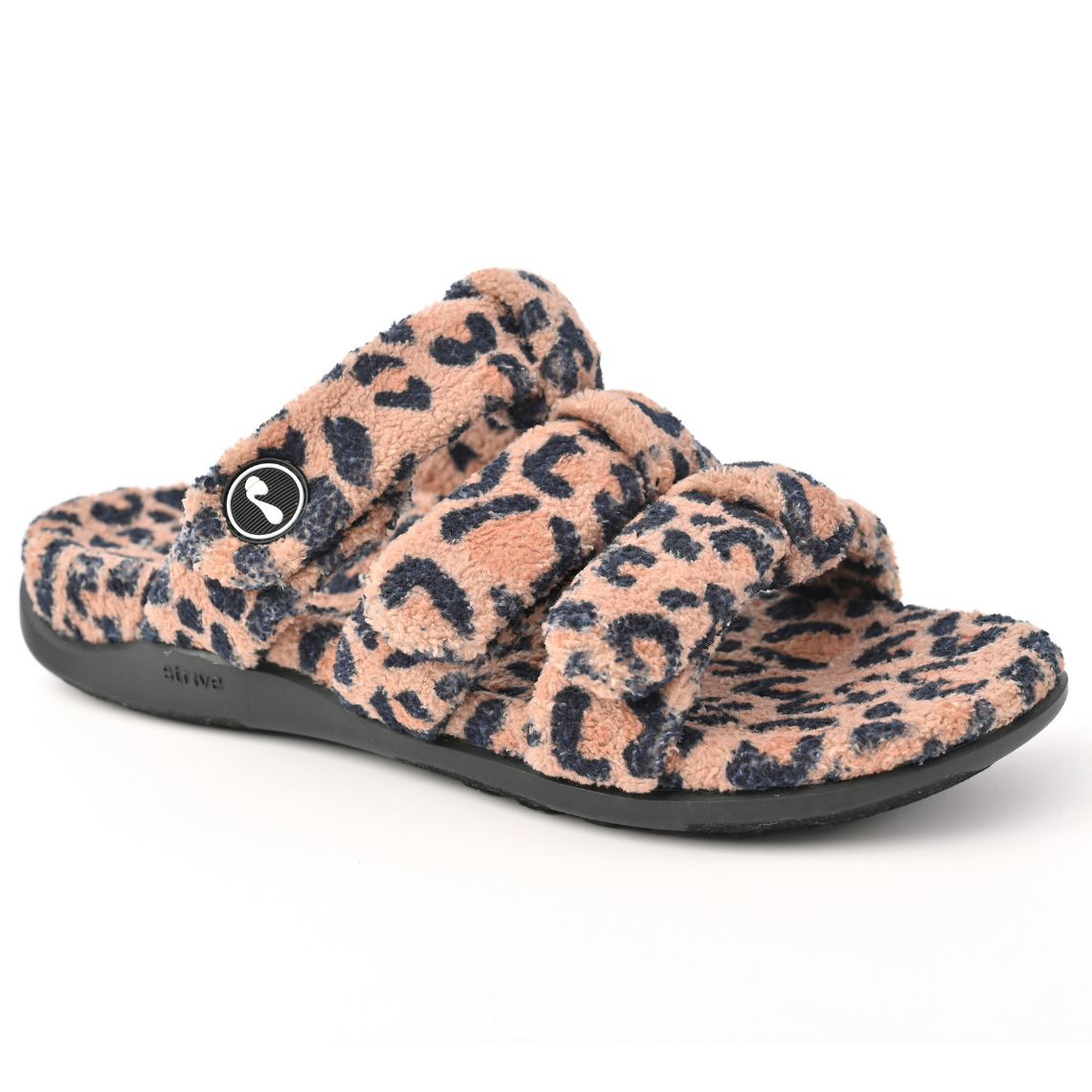 A fuzzy leopard-print slide sandal with a black sole, featuring a small circular logo on the side strap.