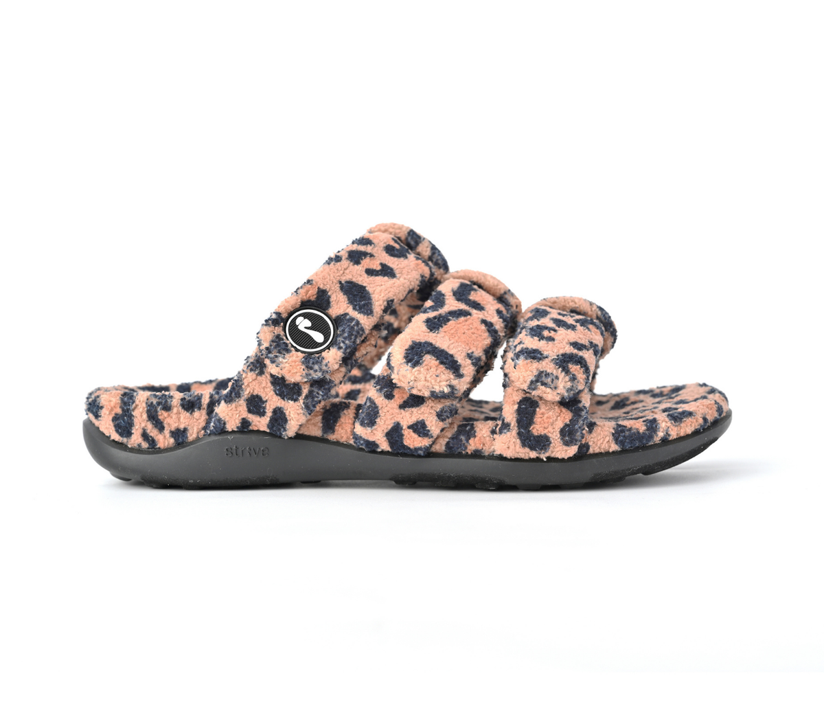 A single fuzzy leopard-print slide sandal with a black sole, shown from the side against a plain white background.