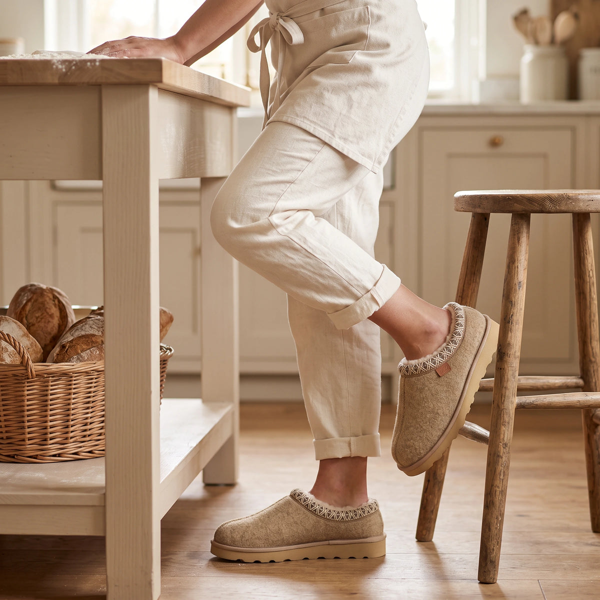 Tan Strive Kensington trainers styled with a jumper dress